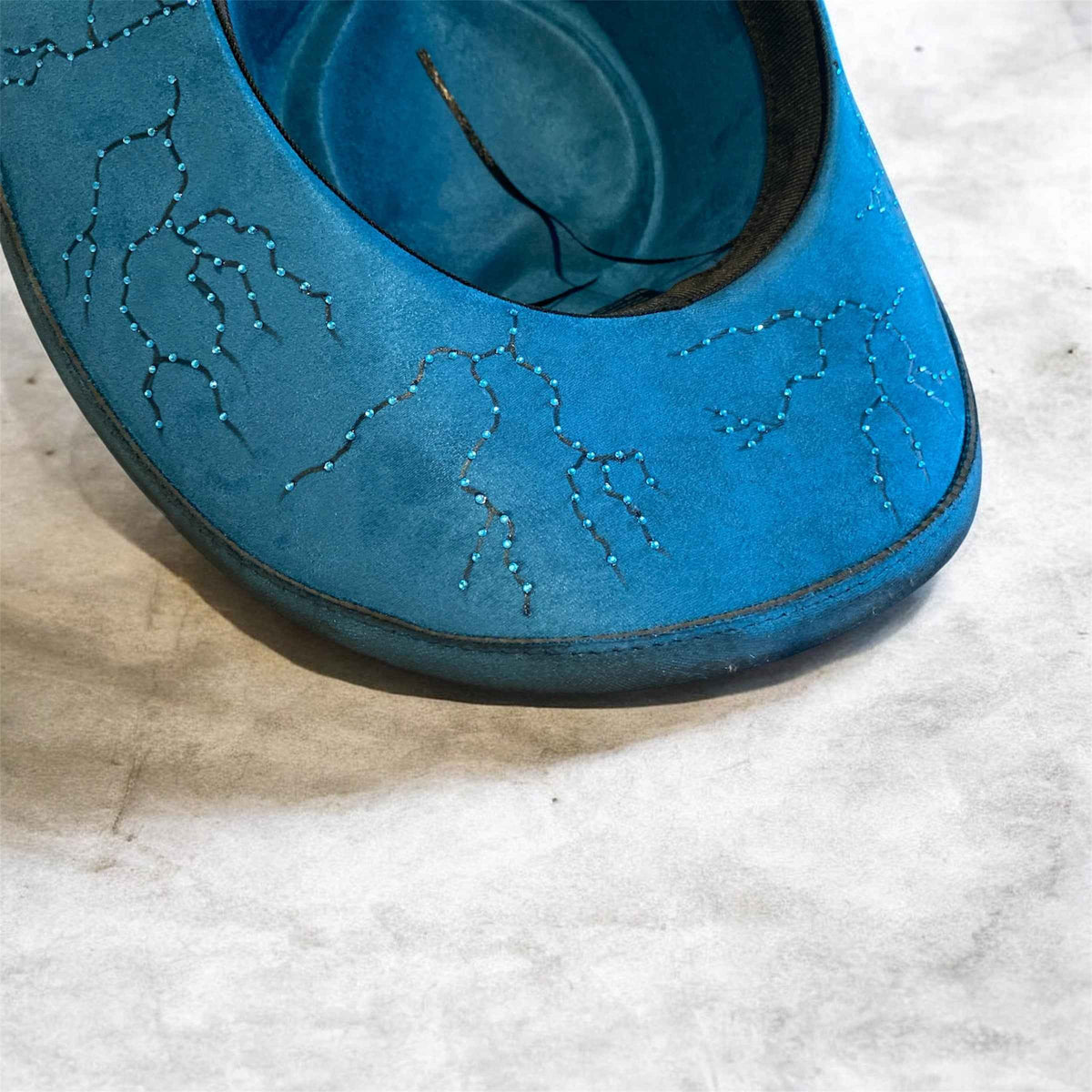 Elevate Your Style with the Deluxe Suedette Cowboy Hat: Blue Fire Lady Edition