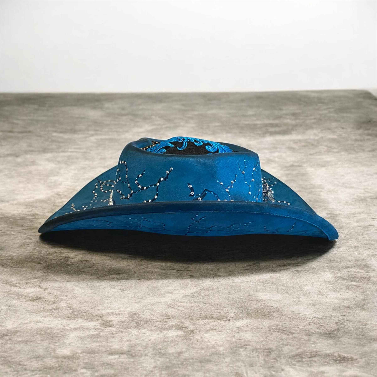 Elevate Your Style with the Deluxe Suedette Cowboy Hat: Blue Fire Lady Edition