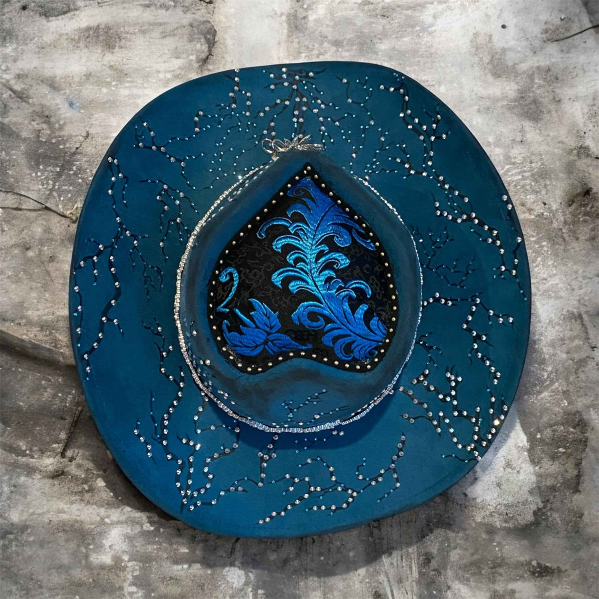 Elevate Your Style with the Deluxe Suedette Cowboy Hat: Blue Fire Lady Edition