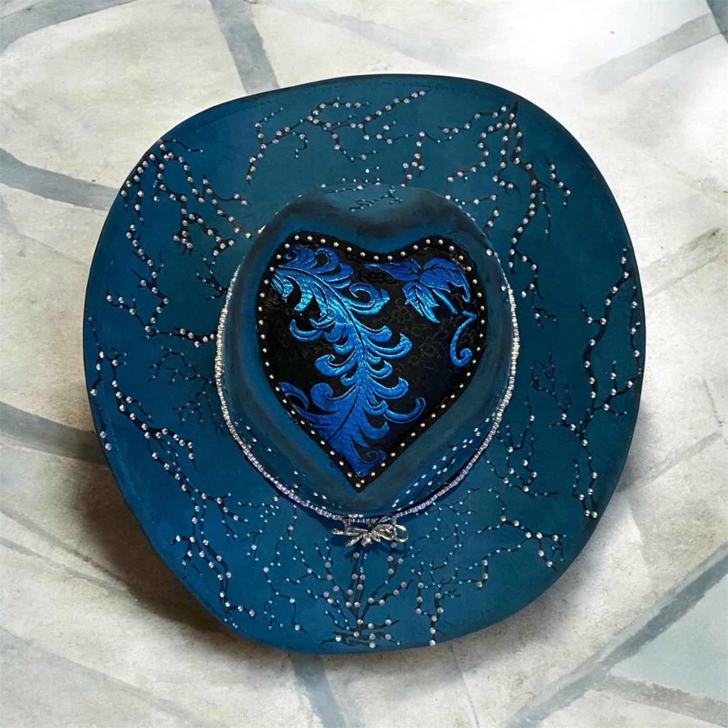 Elevate Your Style with the Deluxe Suedette Cowboy Hat: Blue Fire Lady Edition